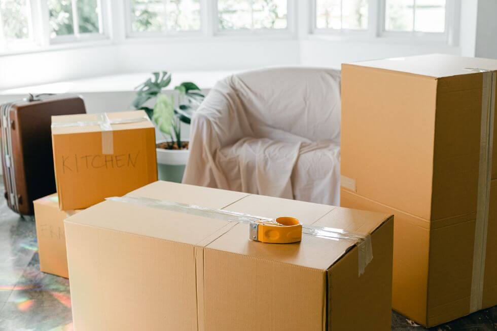 packed up moving boxes - seniors moving checklist